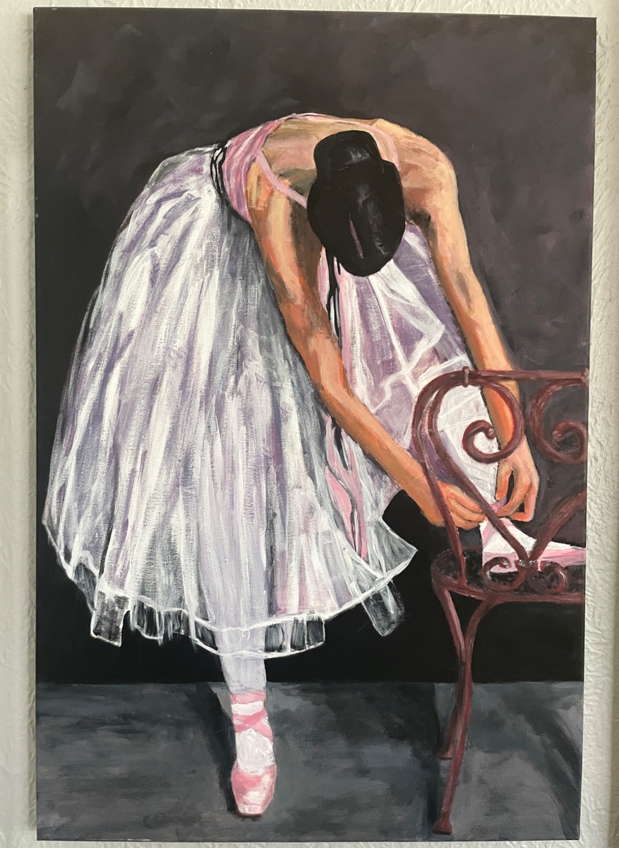 Ballerina tying pointe